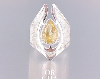 Anillo de citrino y plata de ley 925 · Brillo en forma de lágrima, luz dorada