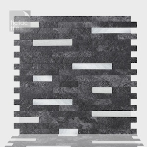 May include: A rectangular wall tile panel featuring a stacked stone pattern with a mix of dark charcoal gray and metallic silver horizontal strips. The surface has a textured, layered appearance with the text tic tac tiles in the top left corner.