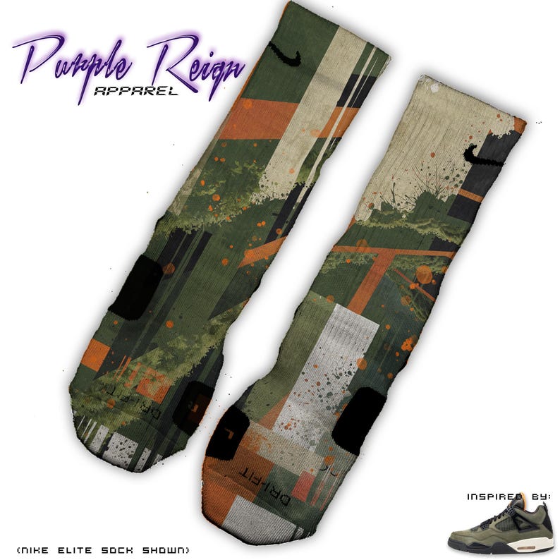 May include: Pair of Nike Elite socks with a camouflage-style design in shades of green, orange, and white. The socks feature the Nike swoosh logo and the text "DRI-FIT". The words "Purple Reign Apparel" are in the upper left corner.