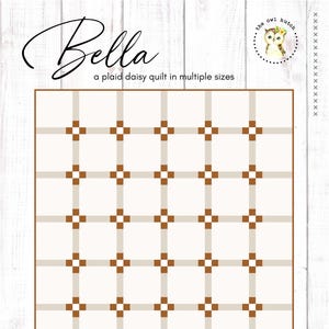 May include: A plaid daisy quilt in multiple sizes. The quilt has a grid design with tan and brown details on a cream backdrop. The word "Bella" is written in a cursive font at the top, with an owl logo in a circle.