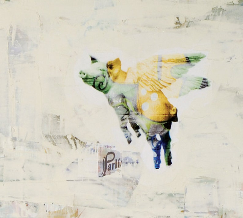 May include: A white background with a collage of a pig with wings. The pig is green, yellow, and white. The wings are yellow and green. The pig is flying.