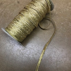 1/4&quot; wide  metallic gold tone elastic