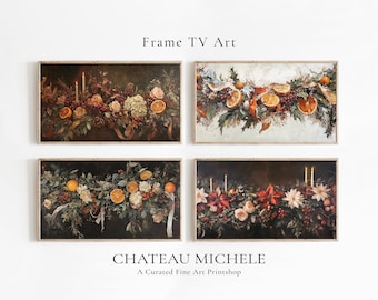 May include: Four framed art prints featuring a garland of oranges, berries, and greenery with candles. The garland is arranged on a dark background with a white background in the top two prints. The bottom two prints have a dark background. The text "Frame TV Art" is at the top of the image and "CHATEAU MICHELE A Curated Fine Art Printshop" is at the bottom.