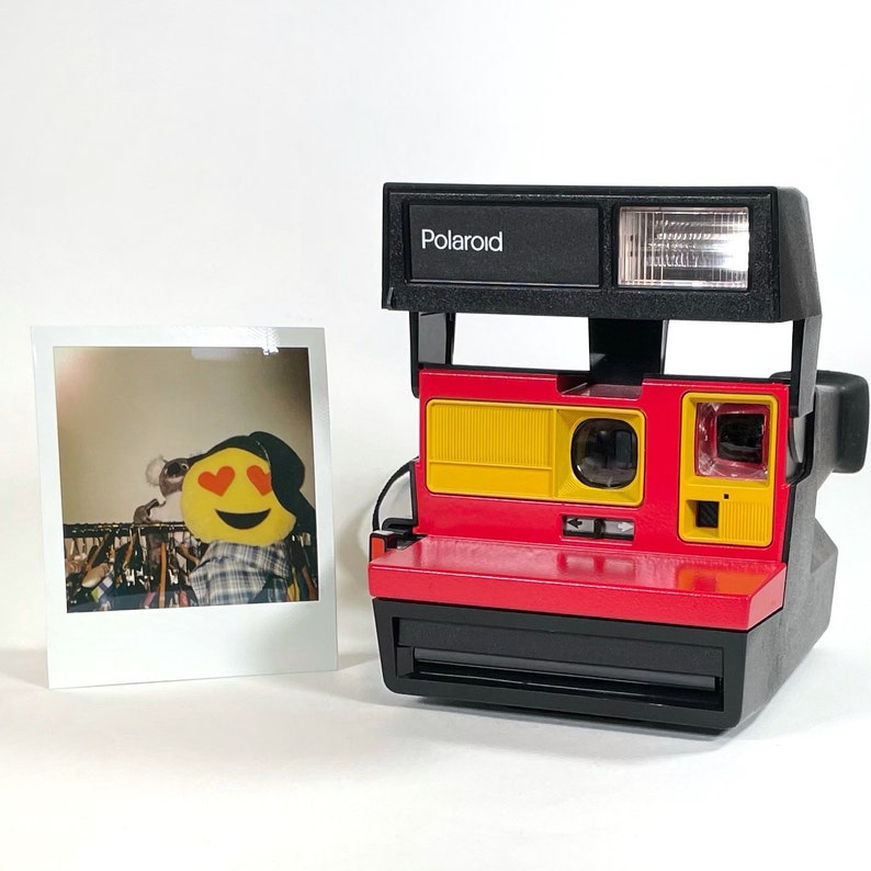 Polaroid Sun 600 with Upcycled yellow and red face Refreshed, Cleaned and Tested image 1