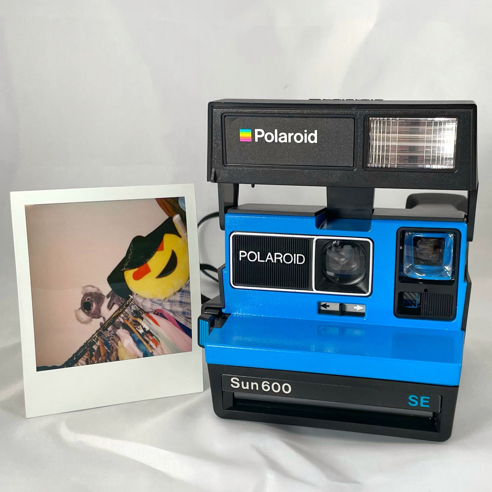 Polaroid Sun 600 SE with Upcycled blue face Refreshed, Cleaned and Tested