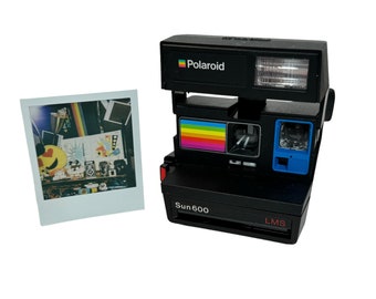 Polaroid Sun 600 with Upcycled blue and rainbow face - Refreshed, Cleaned and Tested