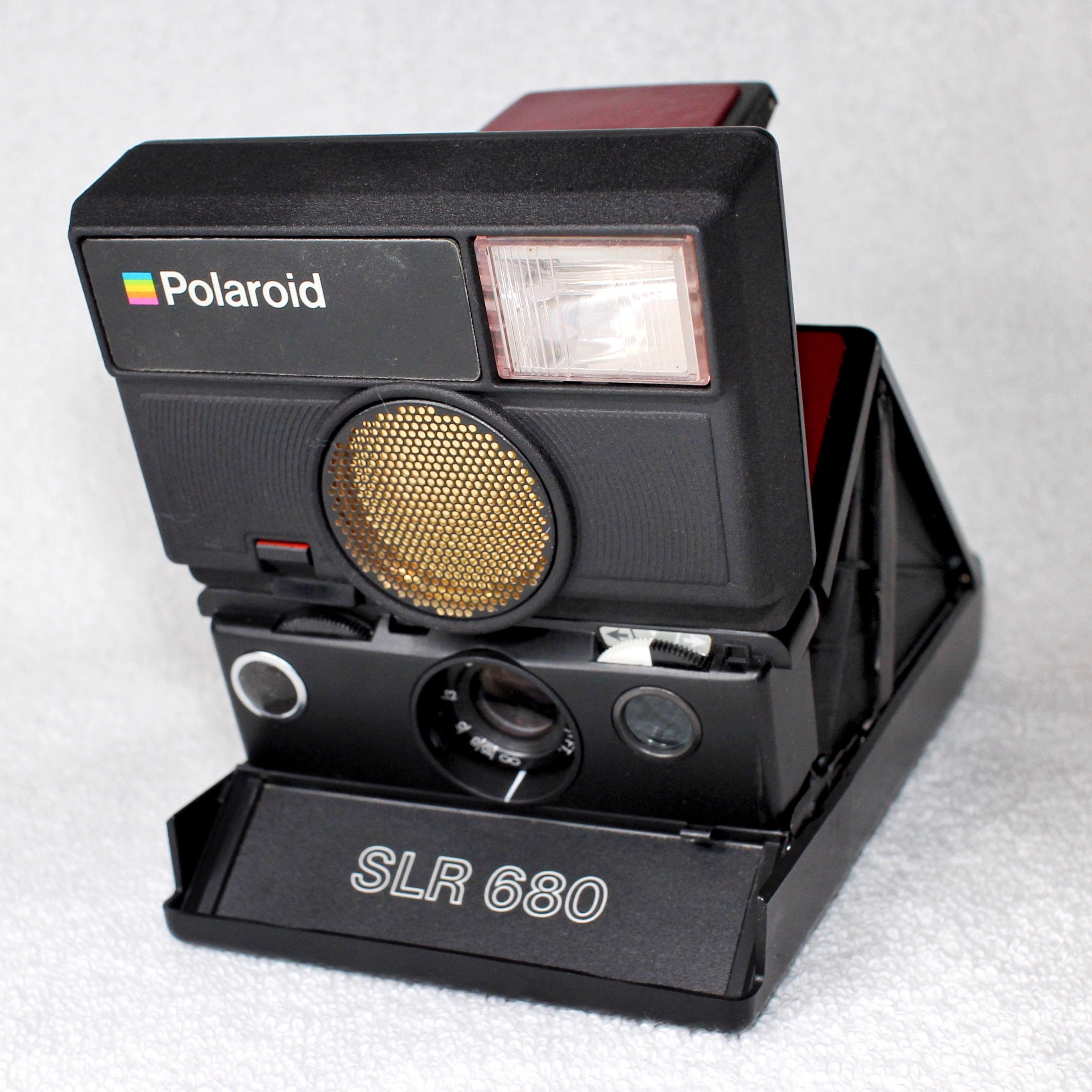 Rebuilt Wine Red skinned Polaroid SLR 680 Camera with new 3D