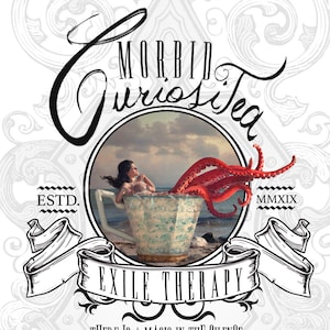 May include: A black and white illustration of a teacup with a mermaid and an octopus inside. The text "Morbid Curiositea" is written in a stylized font above the teacup. The text "Exile Therapy" is written below the teacup. The text "There is a magic in the silence" is written below the text "Exile Therapy". The text "Soul-Soothing" is written below the text "There is a magic in the silence". The text "Caffeine Free Rooibos Tea" is written below the text "Soul-Soothing". The text "Marigold, Hibiscus, Lavender, Peppermint Leaves, Lemon Balm, Orange, Licorice, Passion Flower & Milk Thistle" is written below the text "Caffeine Free Rooibos Tea".