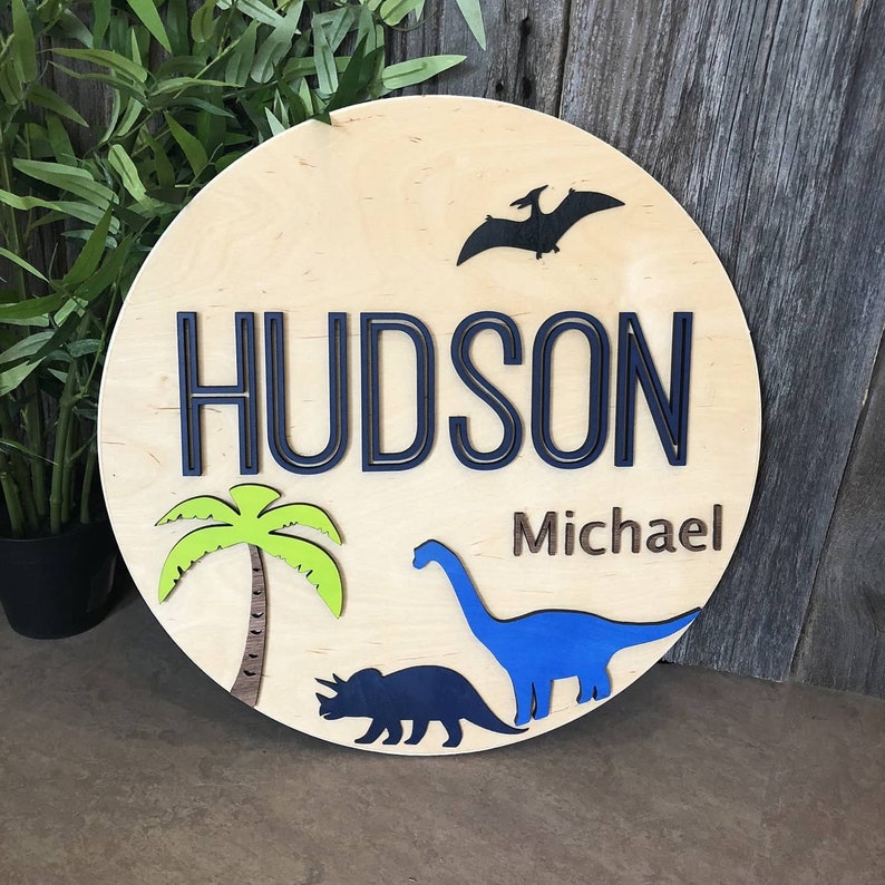 Round Name Sign/Dinosaurs/T Rex/Dinos/Custom Nursery Cutout Wood/Laser Cut Boy/Circle Nursery Decor/ Kids Room Decor/Personalized Name image 1