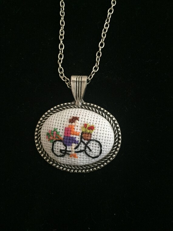 Cross stitch necklace with detailed bicycle pattern. | Etsy