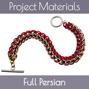 May include: A red and gold chainmail bracelet with a silver toggle clasp. The bracelet is made with a full Persian weave.