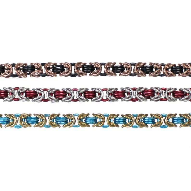 May include: Three chain bracelets in different colors. The top bracelet is black, copper, and silver. The middle bracelet is silver, red, and silver. The bottom bracelet is gold, blue, and gold.