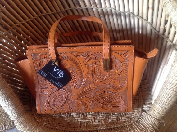 hand carved leather handbags