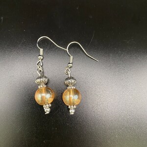 Glass ball earrings - peach, silver-toned setting