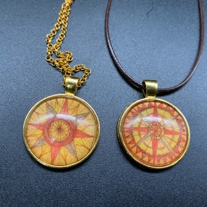 Iron oxide compass collage necklaces - available in gold or silver settings