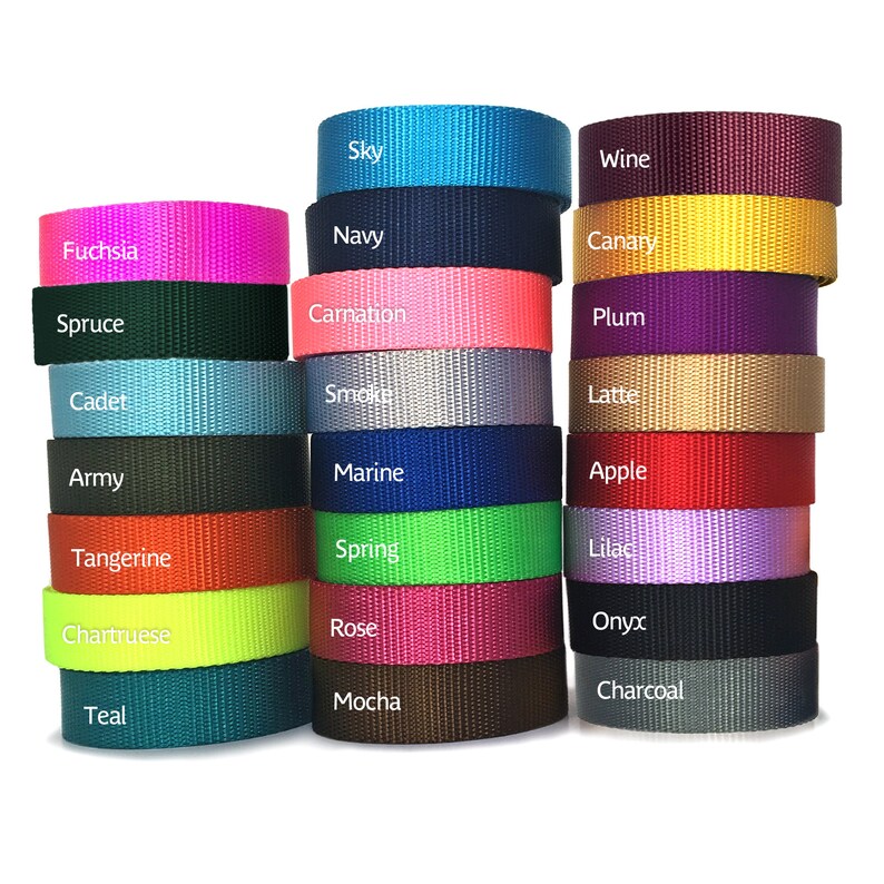 May include: A collection of 24 rolls of webbing in various colors, including fuchsia, navy, sky, canary, plum, latte, apple, lilac, onyx, charcoal, mocha, teal, spruce, carnation, cadet, smoke, army, marine, tangerine, spring, chartruese, rose.