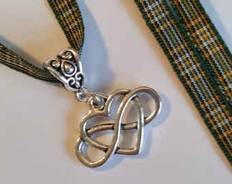 Infinity knot heart charm necklace with scottish tartan ribbon