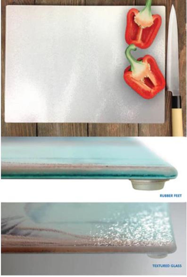 May include: A white glass cutting board with a textured surface. The board has rubber feet on the bottom to prevent slipping. The board is shown with two red bell peppers and a knife.