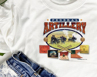 May include: White t-shirt with a vintage-style graphic of a Civil War era cannon and soldiers. The graphic reads "Federal Artillery" and includes a small image of a cannon and the text "3rd Battery".