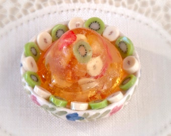 Ceramic  with   flan with fruit, scale 1:12. Making handmade and handpainted