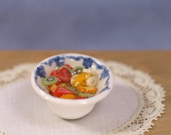 Ceramic kitchen bowl with fruit salad, scale 1:12. Making handmade and glazed by hand.