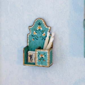 Polychrome candle box blue With candles and matchbox.