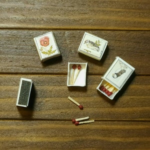 Matchbox 1:12 scale for dollhouses, with wooden matches.  7 mm long