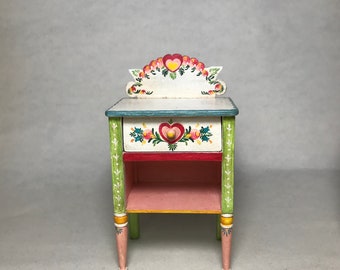 Hand painted miniature beside table . 1:12 scale reproduction of a chest of drawers by the American artist Peter Hunt.