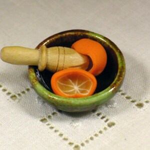 Ceramic bowl with oranges or lemons and juicer wooden, miniature scale 1:12. Making handmade . image 4