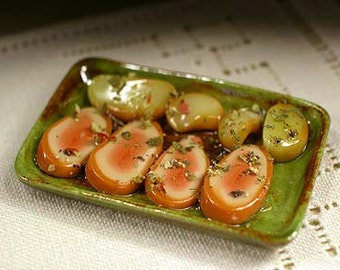 Ceramic kitchen plate with meet slice and patatoes, scale 1:12. Making handmade and glazed by hand.