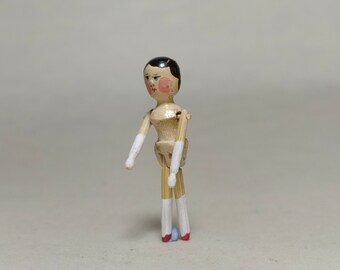 Mini Doll Peg articulated on shoulders and hips 1:12 scale. 31 mm high approximate.