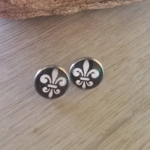 Black and white fleur de lis studs