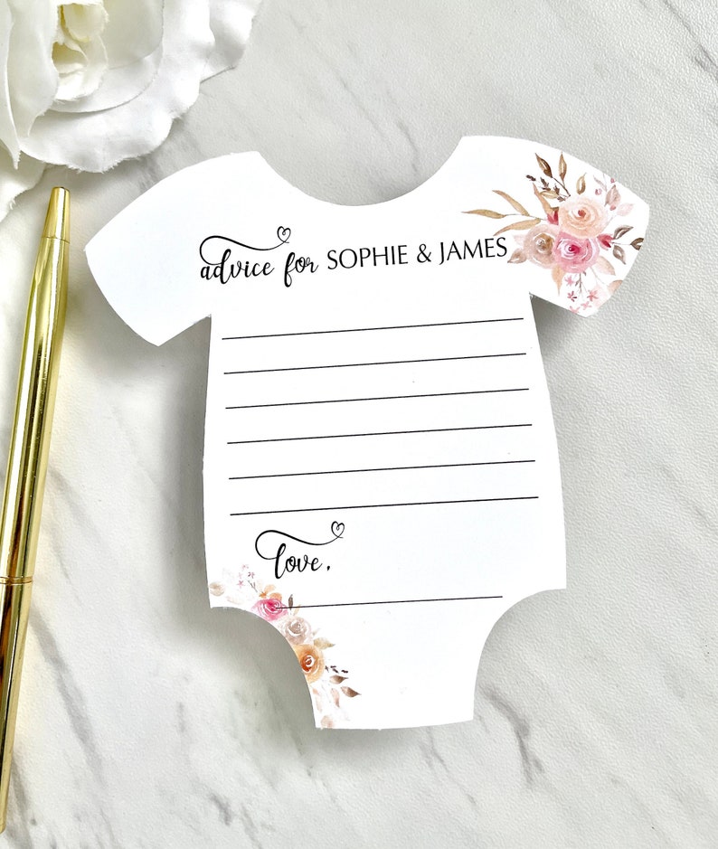 May include: A white baby onesie shaped card with a floral design and the text "advice for Sophie & James" and "love."