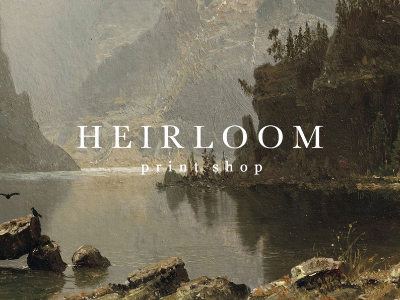 May include: An antique landscape painting featuring a serene lake scene with mountains in the background. The artwork is dominated by muted tones of gray, brown, and green. The text "HEIRLOOM print shop" is displayed in white.