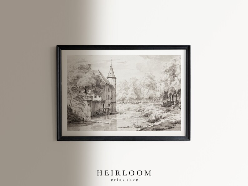 May include: A black and white vintage illustration of a castle with a tower, surrounded by trees and a river. The image is framed in a black frame.