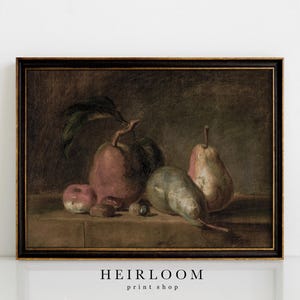 May include: A framed still life painting featuring a collection of fruits. The composition includes a large, reddish-brown apple with a green leaf, pears, and smaller apples. The artwork has a dark, vintage aesthetic.