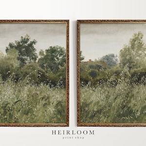 May include: Two framed landscape paintings with a muted green color palette. The paintings depict a field of tall grass with trees in the background. The frames are gold with a decorative border.