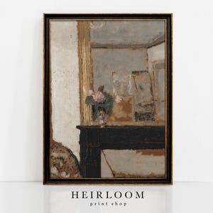 May include: A framed vintage-style print featuring a still life scene with a black mantel, a vase of pink flowers, and a mirror reflection. The frame is black with gold accents. The print has a neutral color palette with the text "HEIRLOOM print shop" at the bottom.
