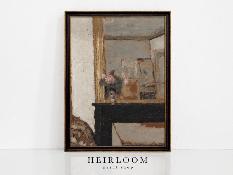 May include: A framed vintage-style print featuring a still life scene with a black mantel, a vase of pink flowers, and a mirror reflection. The frame is black with gold accents. The print has a neutral color palette with the text "HEIRLOOM print shop" at the bottom.