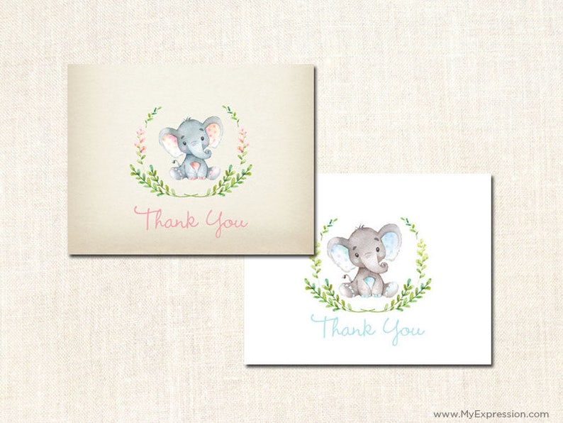May include: Two thank you cards with a watercolor illustration of an elephant surrounded by green leaves. The elephant on the left card has pink accents and the elephant on the right card has blue accents. Both cards say "Thank You" in a cursive font.