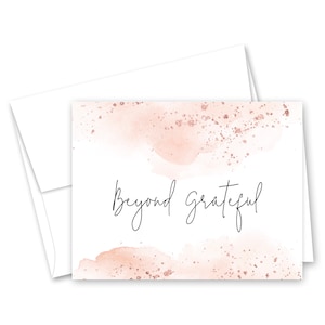 May include: A pink and white watercolor background with gold glitter accents. The text "Beyond Grateful" is written in black cursive.