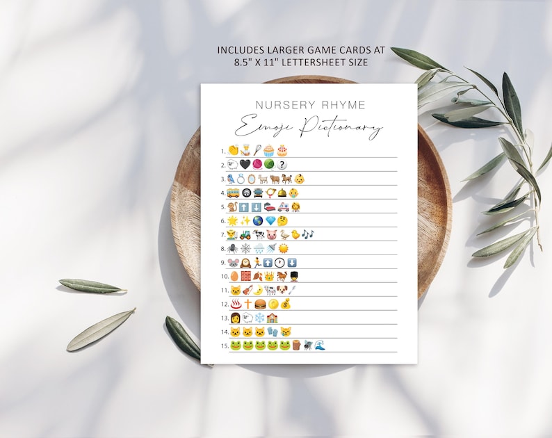 May include: A printable nursery rhyme game card with the title "Emoji Pictionary". The card features a list of numbers 1 through 15 with emojis next to each number.