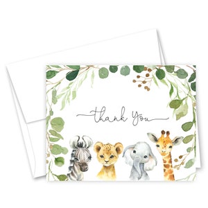 May include: Thank you card with a watercolor illustration of a zebra, lion, elephant, and giraffe surrounded by green leaves. The text "thank you" is written in cursive.