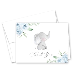 May include: A thank you card with a watercolor illustration of a gray elephant with blue flowers and greenery. The card says "Thank You" in cursive.