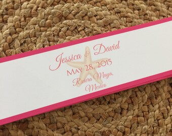 May include: Pink and white wedding favor labels with a starfish design. The text reads "Jessica & David MAY 28, 2015 Riviera Maya, Mexico".