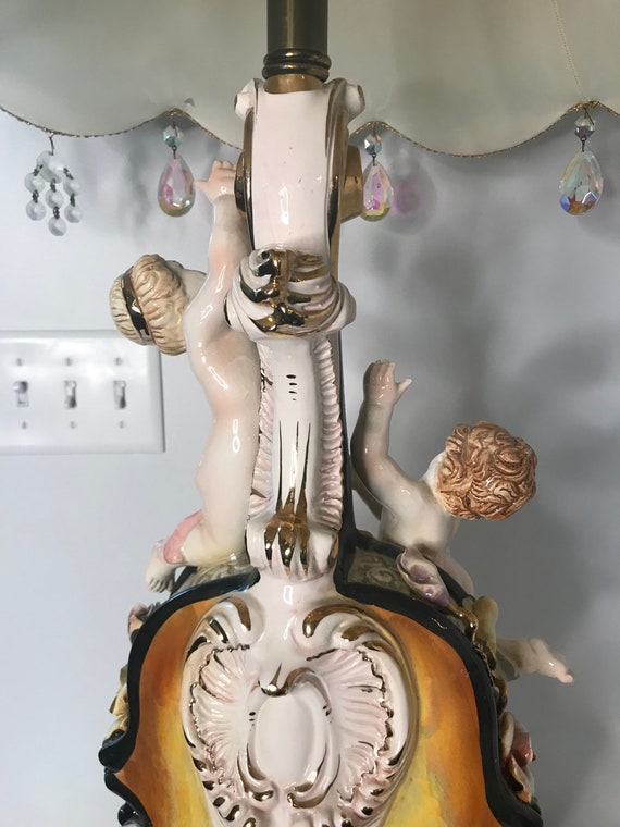Vintage italian cherub lamp online