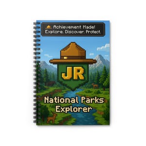 May include: Spiral-bound notebook with a pixelated design featuring a park ranger hat, the letters "JR", and the text "National Parks Explorer." The cover displays a landscape with mountains, trees, and a river, with the words "Achievement Made! Explore. Discover. Protect."