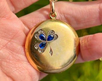 Antique 18 carat gold circular locket with sapphire and diamond shamrock, late 19th century