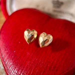 A fun and rather fabulous pair of antique 9 carat gold heart-shaped earstuds, circa 1900
