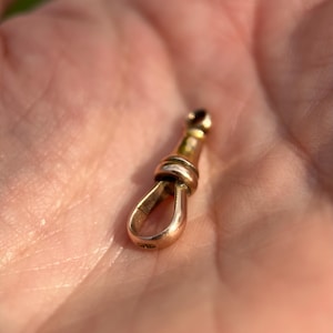 A lovely antique 15 carat gold swivel dogclip clasp, circa 1890-1900